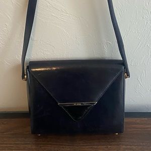 St. John navy leather and black patent purse